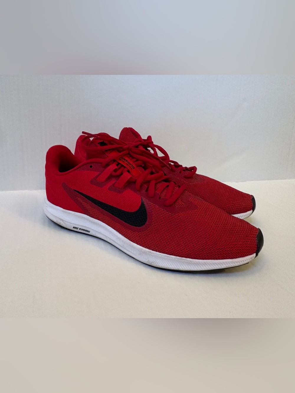 Nike Men’s Red Athletic Running Shoes with Black Swoosh